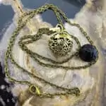 Aroma ketting vlinder brons parfum medaillon lavasteen