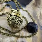 Aroma ketting vlinder brons parfum medaillon lavasteen