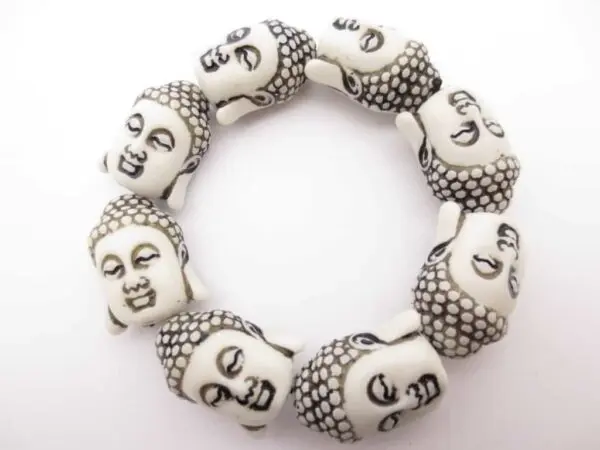 boeddha hoofdjes armband wit