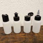 Naturel HDPE fles 50ml met zwarte doseerdop 24/410 voor cosmetica en vloeistoffen