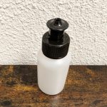 Naturel HDPE fles 50ml met zwarte push pull doseerdop 24/410 voor cosmetica en vloeistoffen