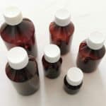 Pet fles dop kindersluiting Plastic fles amber bruin DIN28