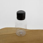 Pet flesje 50 ml transparant kindveilige dop zwart din18 18/410