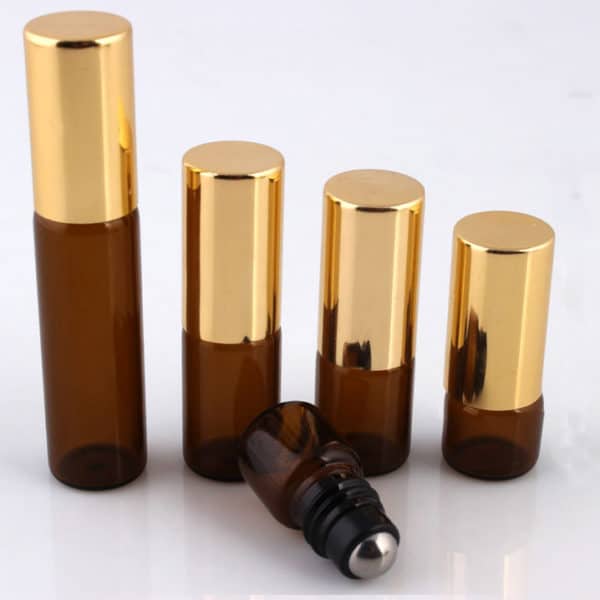 Roller flesjes glas amber bruin lege parfum roll on fles essentiële oliën gouden dop