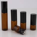 Roller flesjes glas amber bruin lege parfum roll on fles essentiële oliën zwarte dop